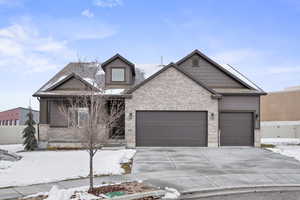 View of front of home featuring a garage