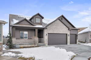 View of front of property with a garage