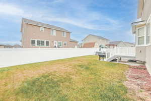 View of yard featuring a deck