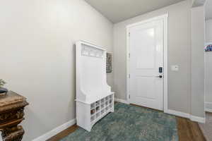 Interior space featuring dark hardwood / wood-style flooring