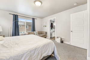 Bedroom featuring carpet flooring