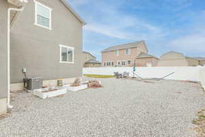 View of yard with a patio area and central air condition unit