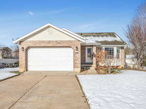 Ranch-style house with a garage