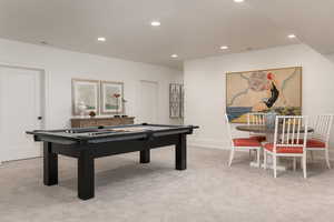 Game room featuring light carpet and pool table