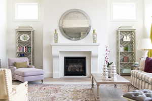 Living room with hardwood / wood-style flooring