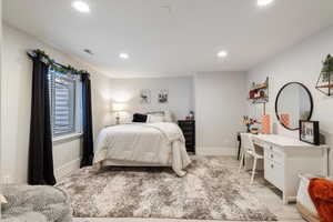 Bedroom featuring light wood-type flooring