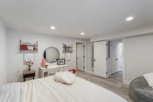 Bedroom with light wood-type flooring