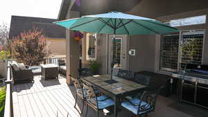 Deck with an outdoor hangout area