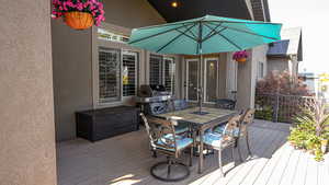 Wooden deck featuring french doors