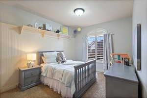 View of carpeted bedroom