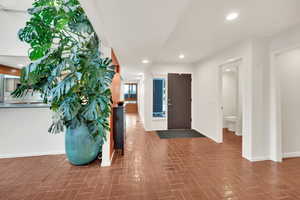 View of entrance foyer and hall to family room