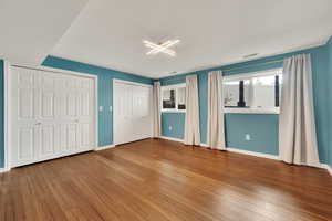 Bedroom with multiple closets