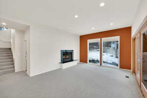 Living room with carpet flooring and Big Windows