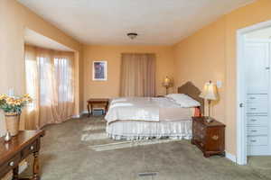 Bedroom featuring carpet floors