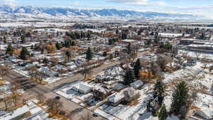 Snowy aerial view with a mountain view