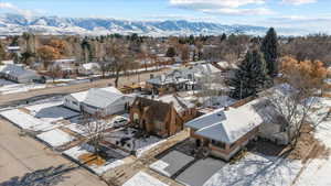 Snowy aerial view featuring a mountain view