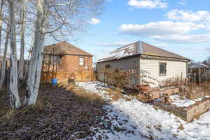 View of snow covered property