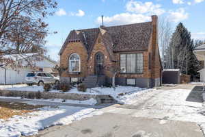 View of front facade with a storage shed