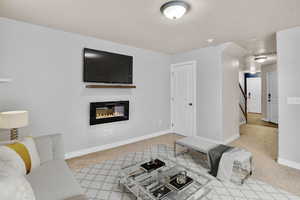 Living room with light colored carpet