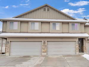 View of front of property with a garage