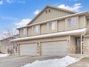 View of front of home featuring a garage