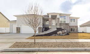 Prairie-style home featuring a garage