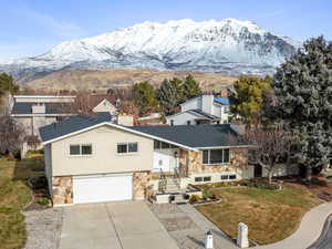 View of front of property, showcasing the landscaping