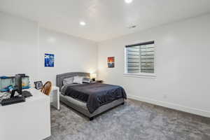 Bedroom featuring carpet