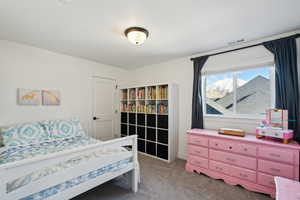 View of carpeted bedroom