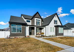 View of front of home featuring a front yard