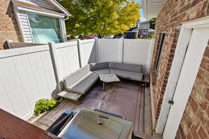 View of patio with outdoor lounge area