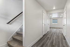 Hallway featuring dark hardwood / wood-style floors