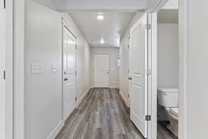 Corridor featuring light hardwood / wood-style flooring