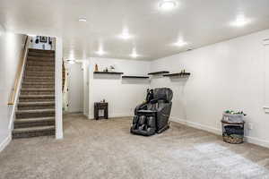 Interior space with carpet floors and a textured ceiling