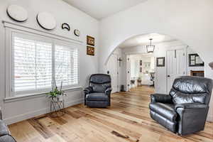 Sitting room featuring light hardwood / wood-style flooring