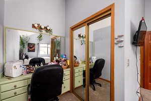 View of carpeted home office