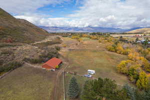 Aerial view featuring a mountain view and a rural view