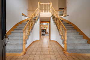 Stairway featuring tile patterned flooring