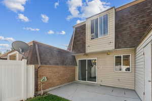 Rear view of house with a patio area