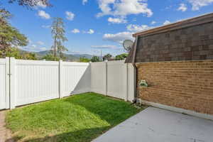 View of yard with a mountain view