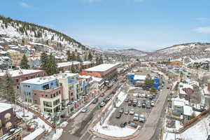 Snowy aerial view with a mountain view