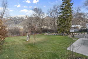 View of yard featuring a mountain view