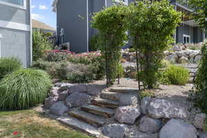 Eastside steps to access yard from the front