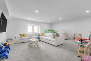 Flex room under the garage. Has exit to exterior.