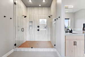 Primary Bathroom with duel shower heads and separate toilet room.