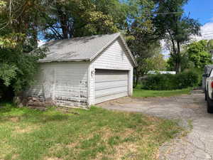 Garage with a lawn