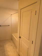 Bathroom with plus walk in shower