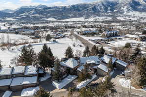 Snowy aerial view with a mountain view