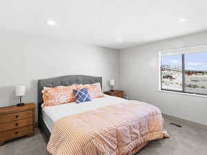 Bedroom featuring carpet flooring