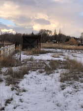 View of yard layered in snow